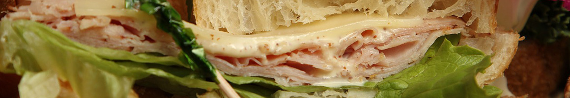 Eating Sandwich at Tatro's Soup & Sandwich restaurant in St Albans City, VT.